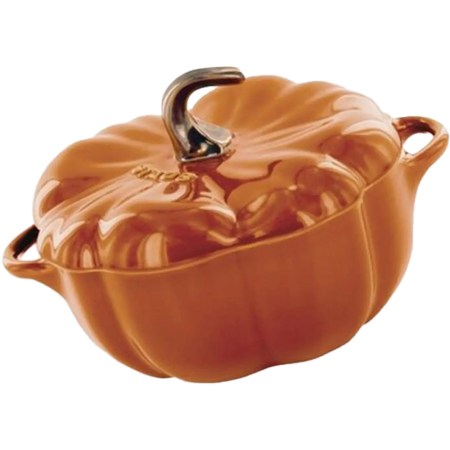 Orange pumpkin-shaped cast iron Dutch oven with a shiny metallic stem handle on a white background.