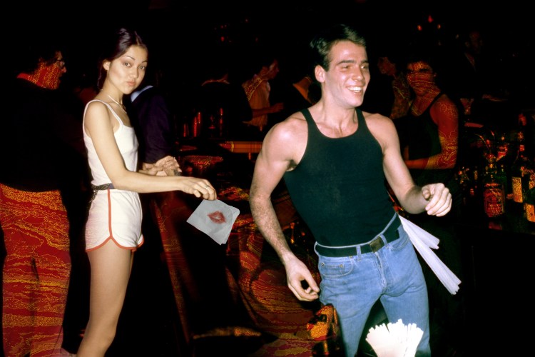 Bartenders manning the stick at the infamous Studio 54 in NYC.